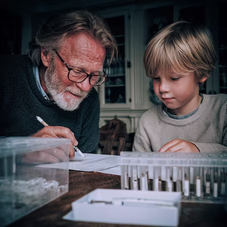 grandfather taking dna test with grandson